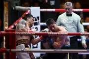 Usyk Controversially Stops Verhoeven to Avoid Major Upset
