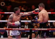Usyk Stops Verhoeven in Controversial 11th-Round TKO to Retain Title
