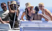 Victoria Beckham Flashes Toned Arms in Ibiza as Harper Matches Brother's Girlfriend
