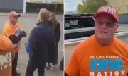 Video shows Liberal senator in scuffle with One Nation volunteer at polling booth