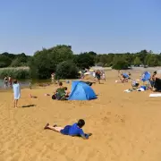 Wild Swimming Lake with Sandy Beach Perfect for Heatwave Escapes