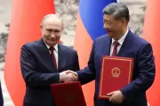 Xi Warns World Risks Returning to Law of Jungle in Putin Summit