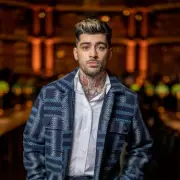 Zayn Malik Fans Hurl Water Bottles After Tour Date Merges