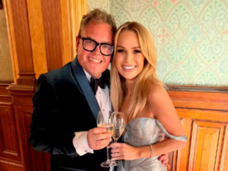 Alan Carr's 50th Birthday: Amanda Holden Plants a Kiss on His Lips