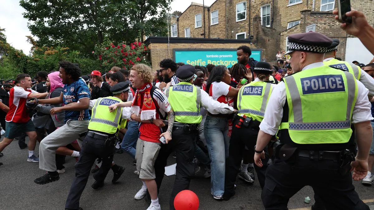 Nine Arrests and 75 Rescued from Fire at Arsenal Trophy Parade