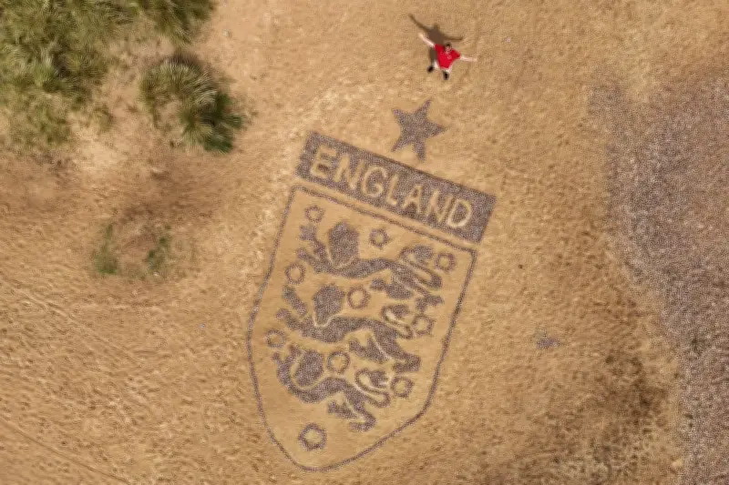 Artist Crafts Giant England Badge on Beach for World Cup