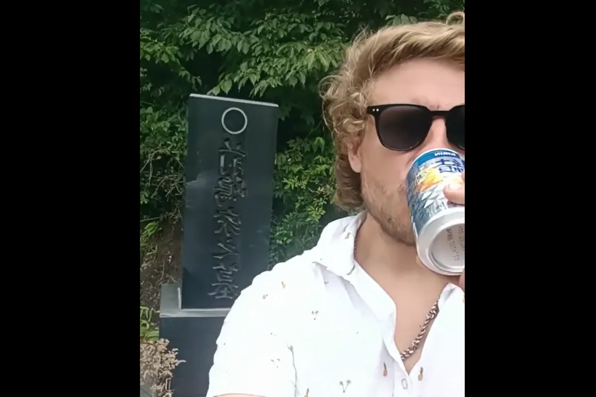 Australian Tourist Sparks Outrage by Drinking Beer Offering at Japanese Grave