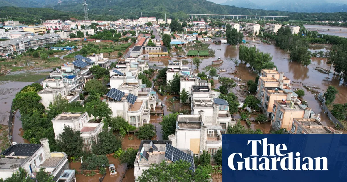 Beijing Floods Claim 30 Lives, Force 80,000 Evacuations