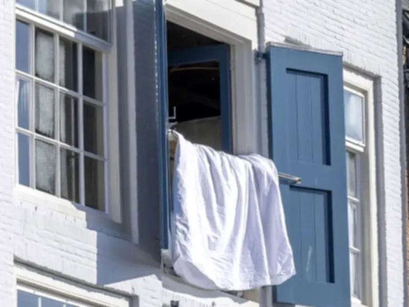Brits Urged to Hang Damp Towels from Windows in Heatwave Hack