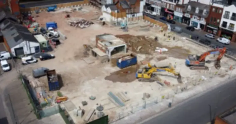 Camberley's £1.4m Transformation: Derelict Department Store Demolished for 550 New Homes