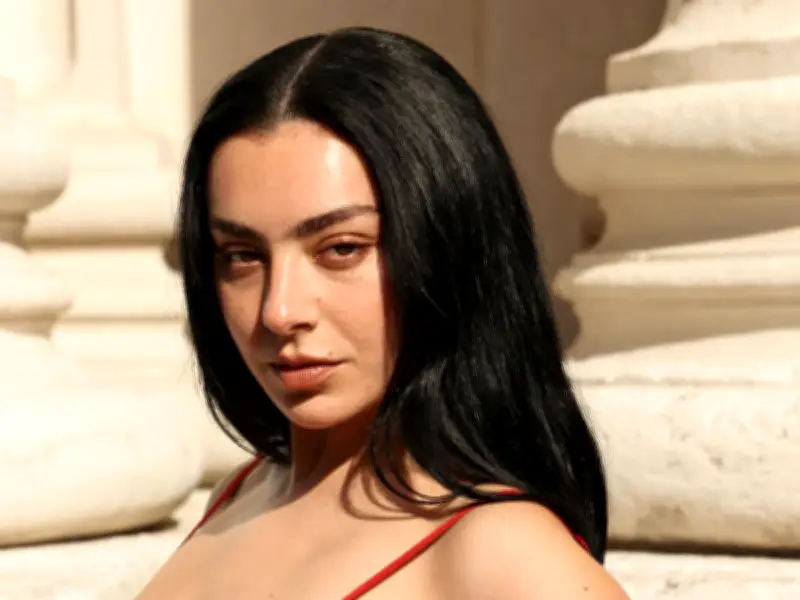 Charli XCX and Madonna Twin in Red Ensembles at Paris Fashion Week