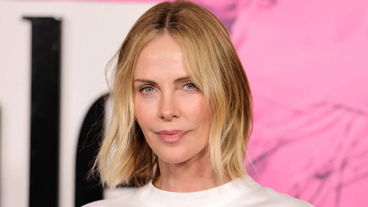 Charlize Theron's Red Light Mask Secret For Youthful Glow