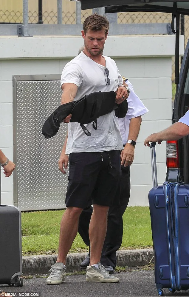 Chris Hemsworth Spotted Wearing Back Support Belt at Airport