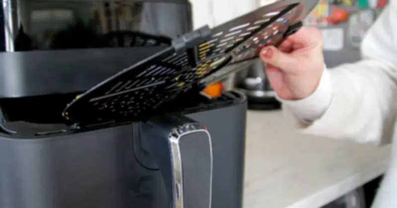 Clean Your Air Fryer Without Scrubbing Using 2 Common Kitchen Items