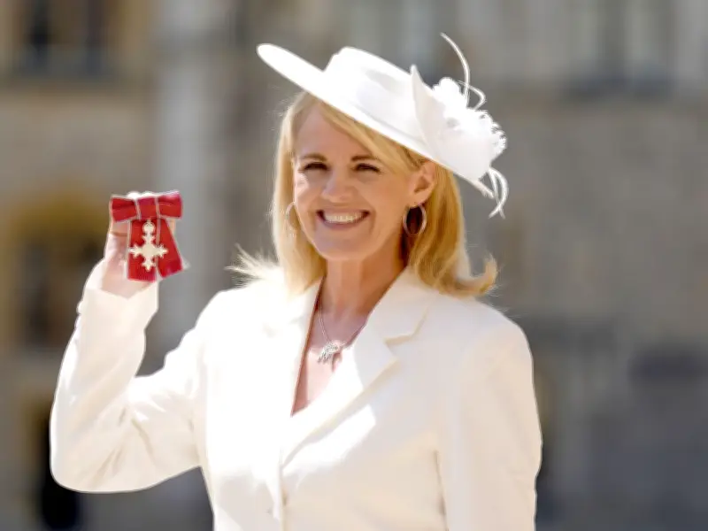 Coronation Street's Sally Lindsay Beams as She Receives MBE from Prince William