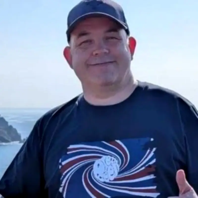 Dad, 48, Dies After Collapsing at School; Tributes Paid to 'Gentle Giant'