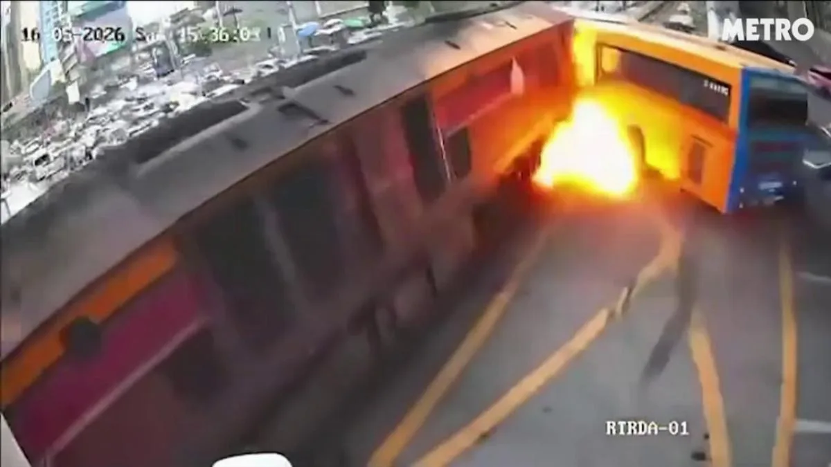 Eight Killed as Bus Explodes in Fireball After Train Crash in Bangkok
