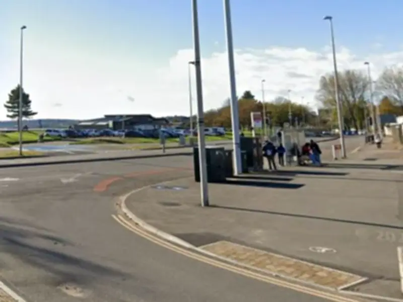 Elderly woman injured in bike crash on busy Swansea road
