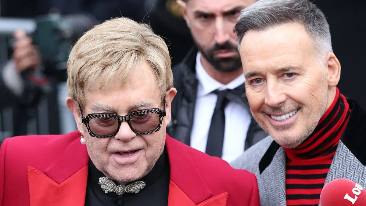 Elton John, 78, supported by husband David Furnish at Paris Fashion Show amid health struggles