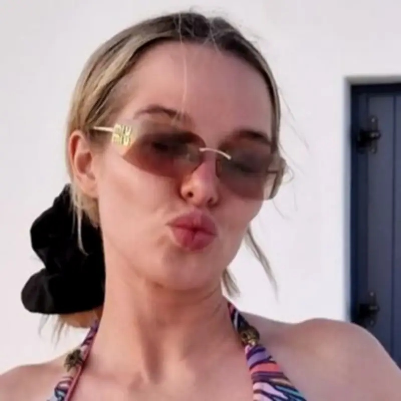 Helen Flanagan's Curves Spill Out of Dangerously Small Bikini Top in New Photo