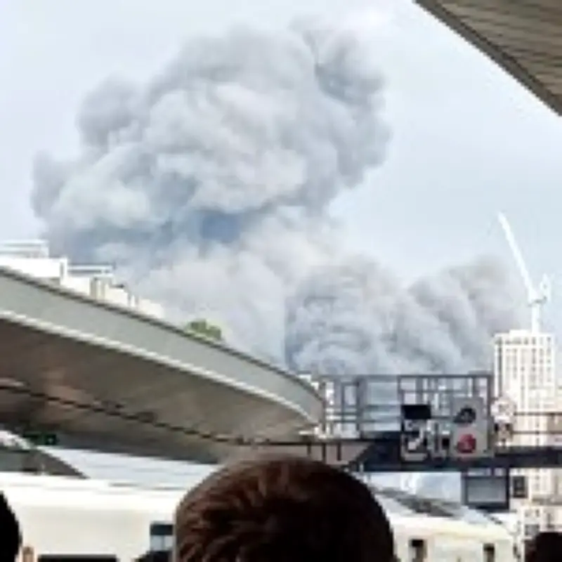 Huge recycling centre fire sends smoke across London, halting trains