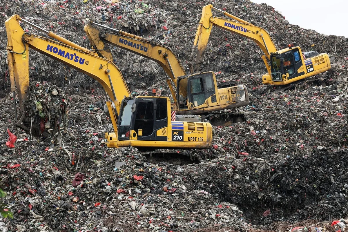Five Dead and More Missing After Giant Landfill Collapse in Indonesia