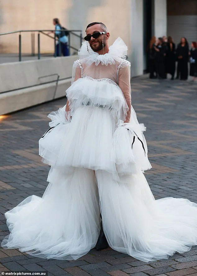 Jamie Azzopardi Returns to Australian Fashion Week in Wedding Dress Held by Four Assistants