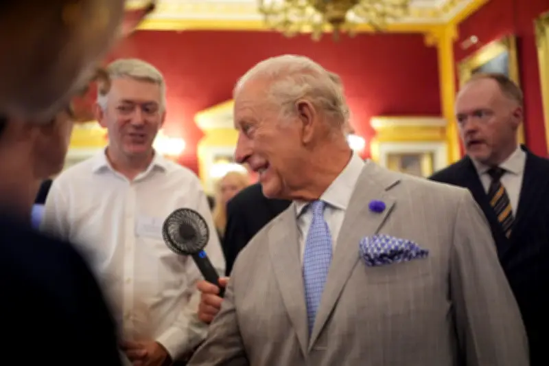 King Charles Fanned by Aide at Scorching London Climate Week Reception