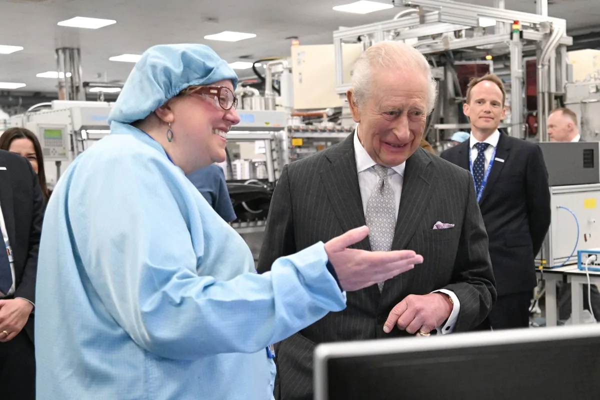 King Charles Jokes About Plaque Mishap During Solar Firm Visit