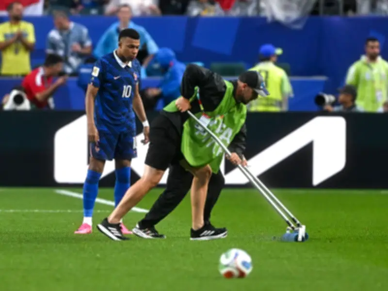 Kylian Mbappe Helps Ground Staff During Two-Hour World Cup Rain Delay