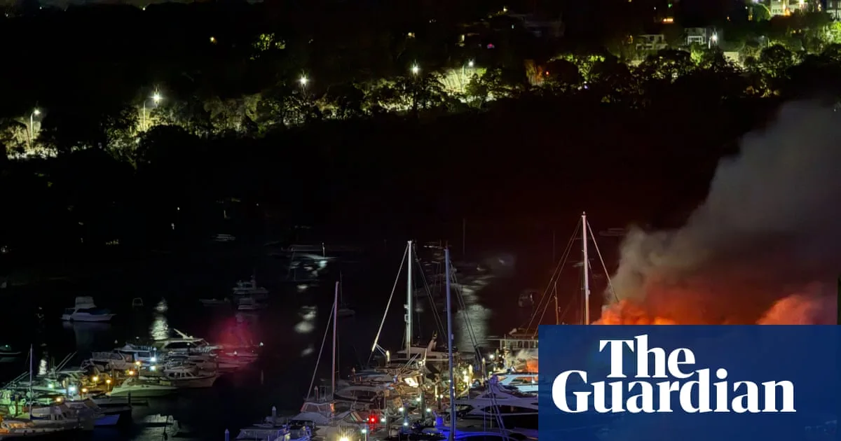 Three luxury yachts sink in Sydney marina fire