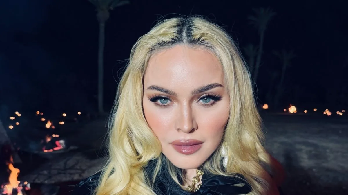 Madonna Takes 'Second Uber Ever' to Watch Twin Daughters Play for Tottenham Hotspur Academy