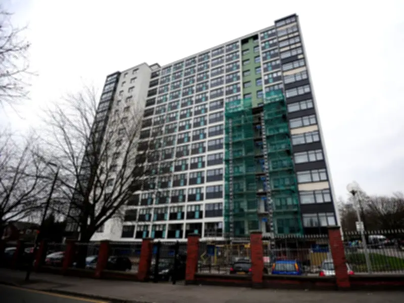 Man Critical After Fall from Salford Tower Block, Two Arrested