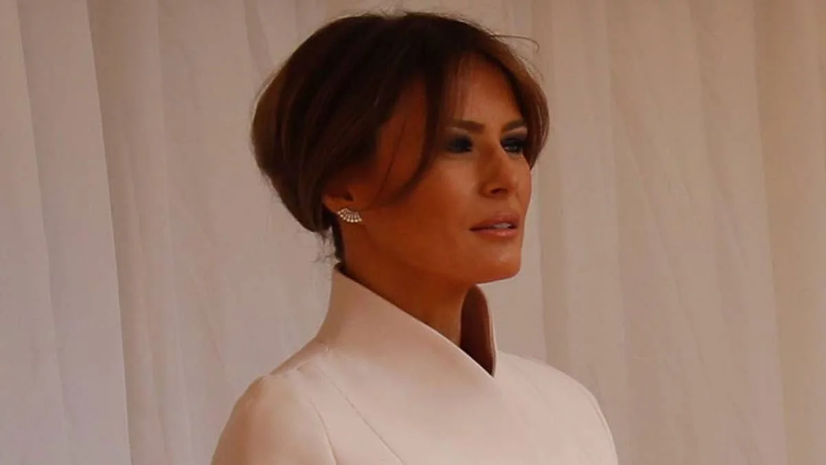 Melania Trump Stuns in Pale Pink Suit for First Meeting with Queen