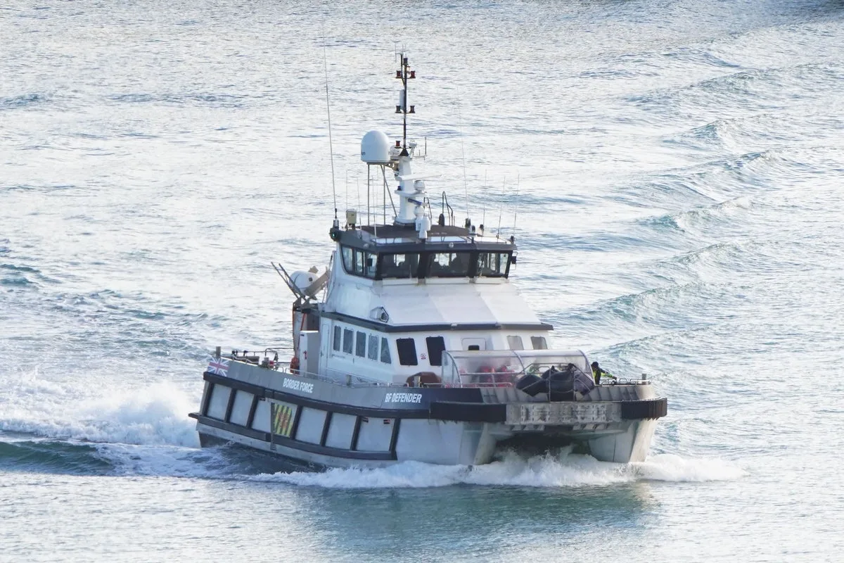 Migrants in Blankets Arrive After Channel Crossing