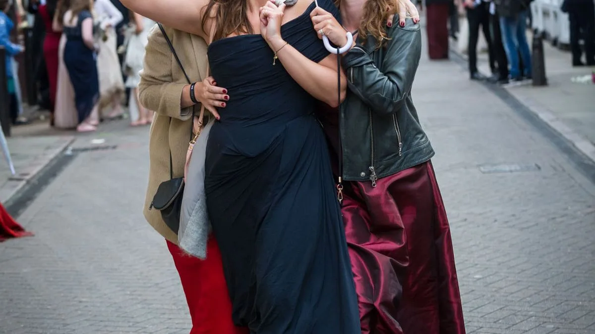 Cambridge Students Party Through Rain at £500 Trinity May Ball