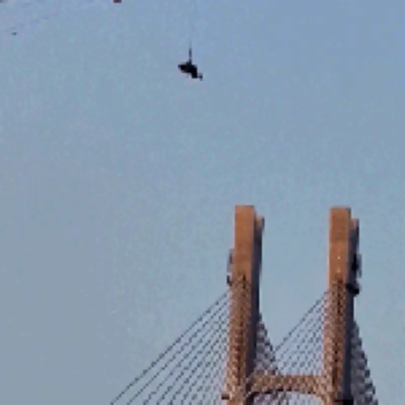 Paraglider Dangling 60m After Tangling on Tower Crane in China