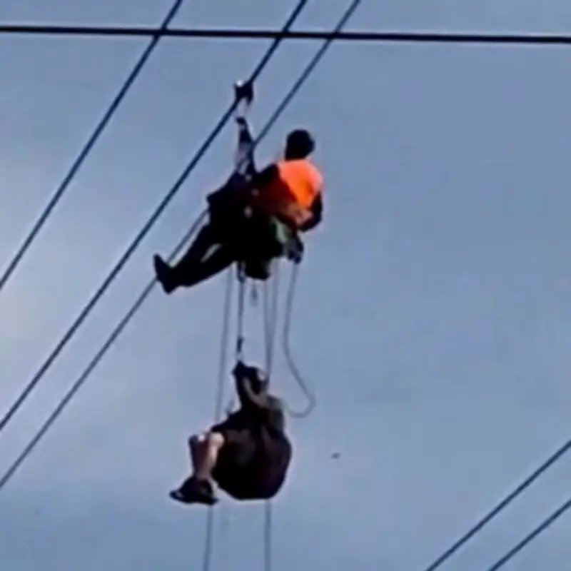 Paraglider Dangling from Cable Car Wires After Crash in Switzerland