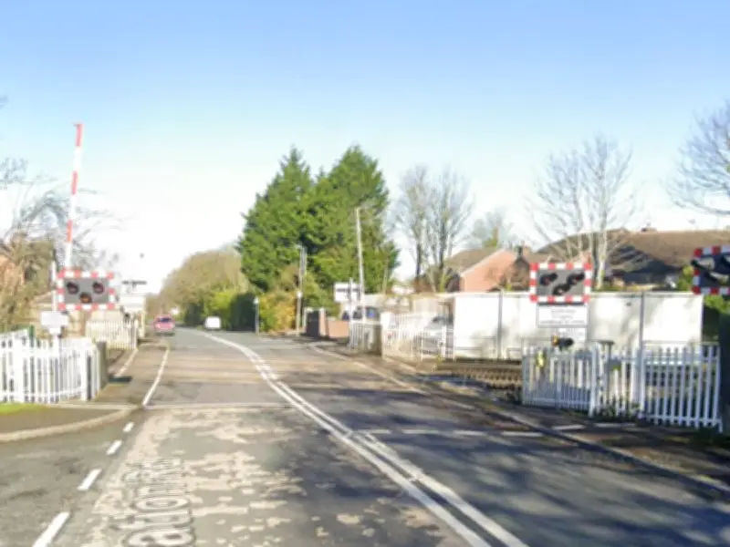 Person dies, child critically injured after train hits car in Lancashire