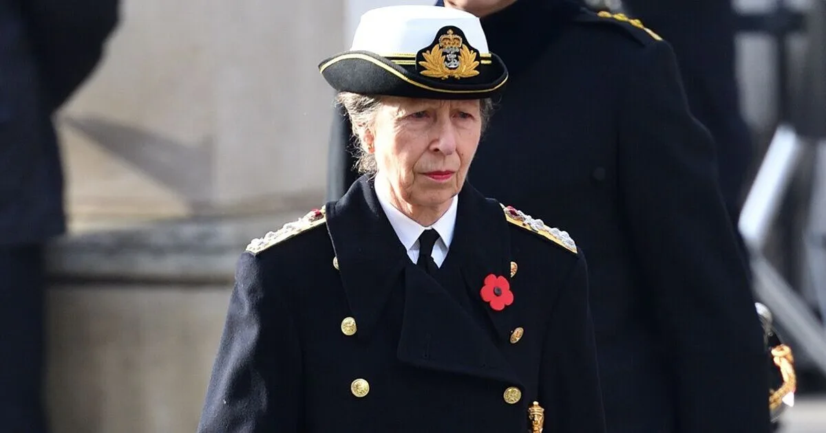 Princess Anne Hands Umbrella To Churchgoer In Downpour