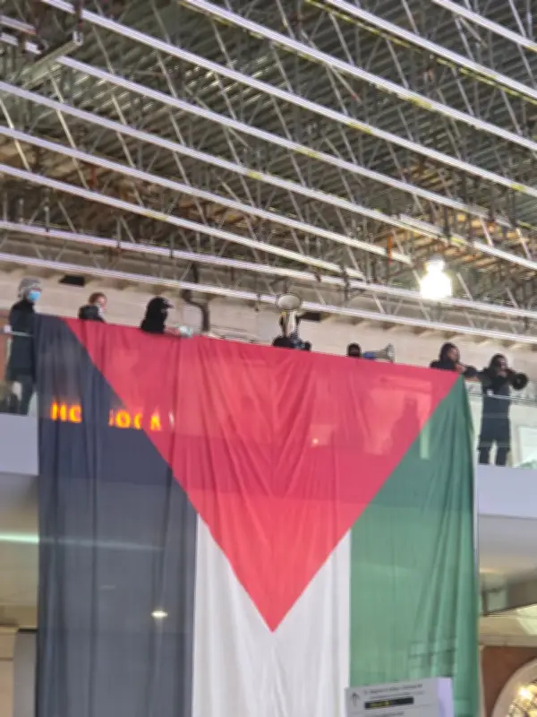 Pro-Palestine Protesters Rally at London Waterloo Station During Rush Hour