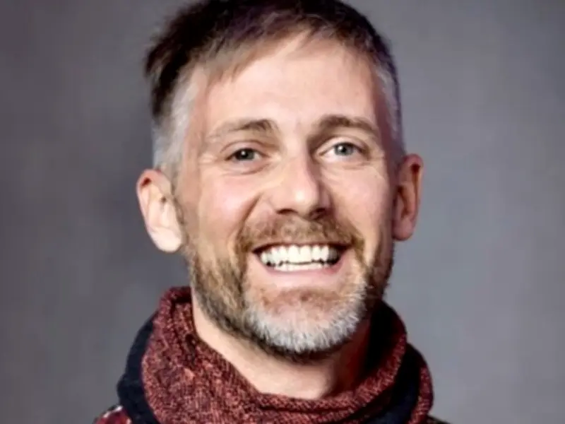 Professor cleared after car thief dies in headlock incident