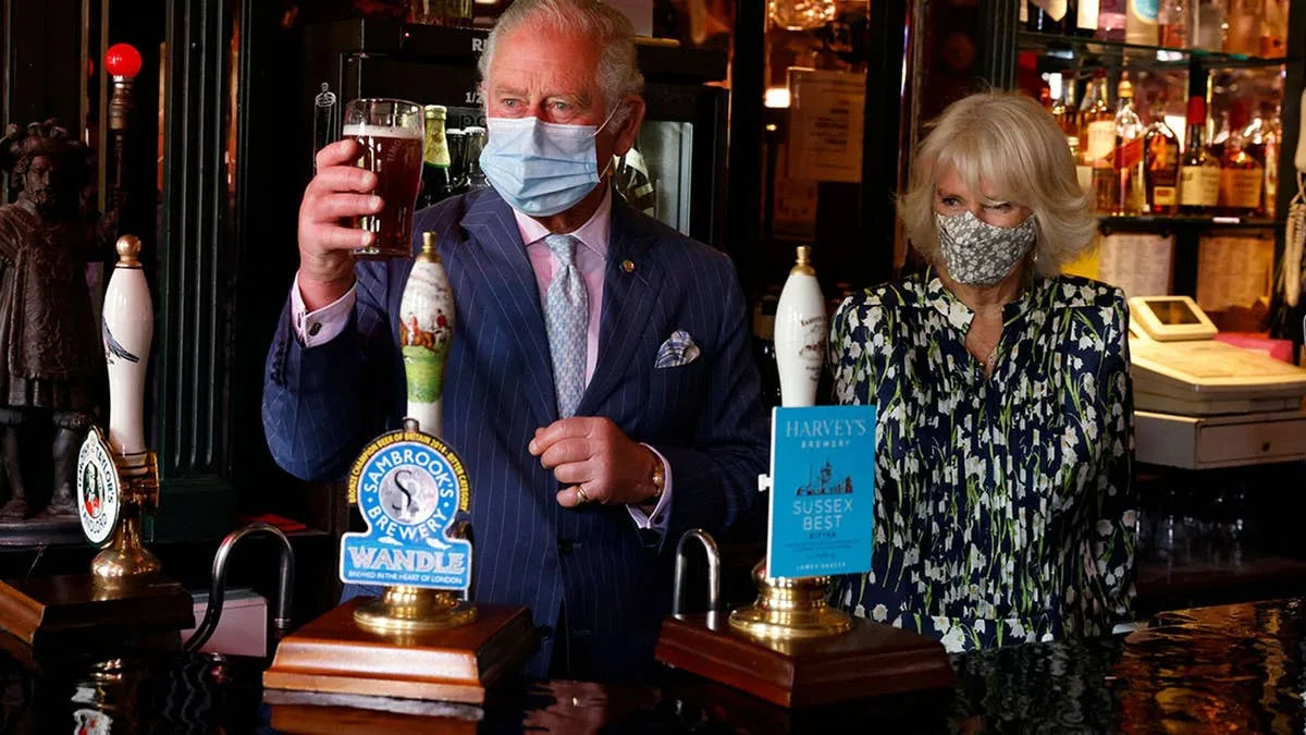 Queen Camilla Jokes About King Charles While Pulling Pint