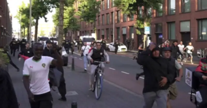 Riot Police Use Water Cannons After Netherlands vs Morocco World Cup Clash