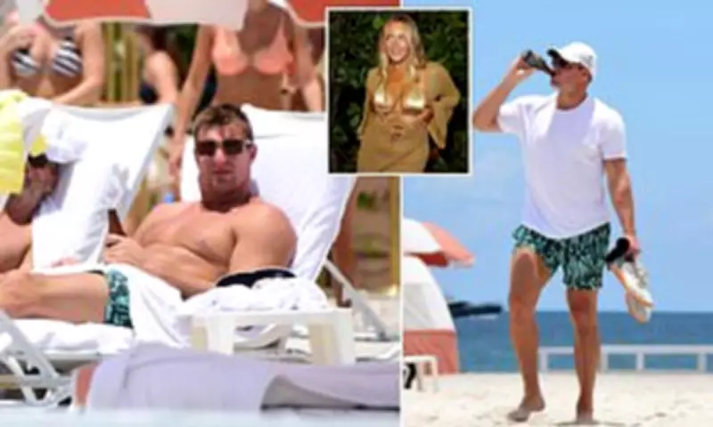 Rob Gronkowski Relaxes at Miami Beach with Wellness Drink During Swim Week