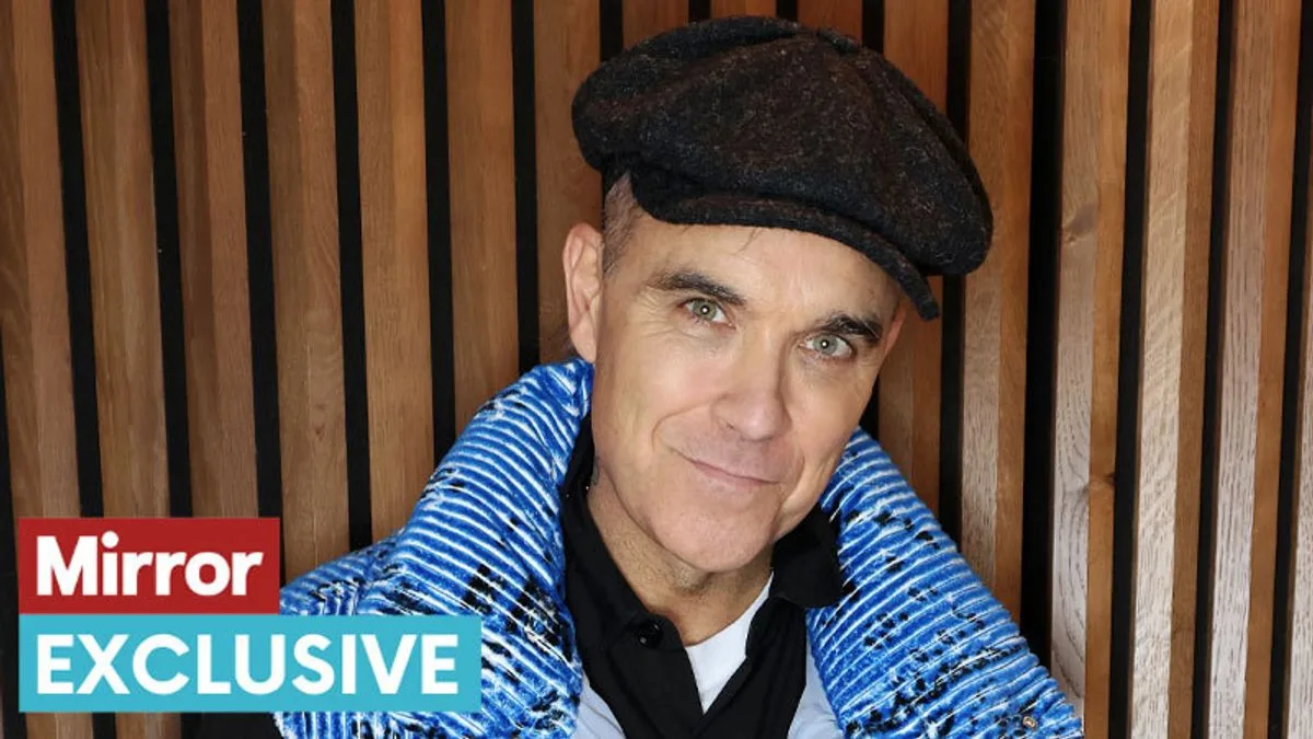 Robbie Williams Opens Up About 'Manopause' and Ageing at 49