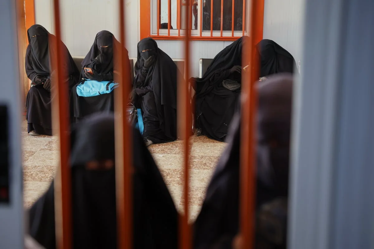 Services resume at Syrian camp housing IS families after government takeover