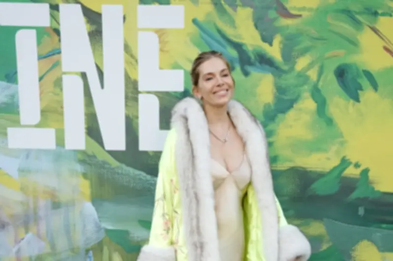 Sienna Miller Braves Heatwave in Fur Coat at Serpentine Summer Party