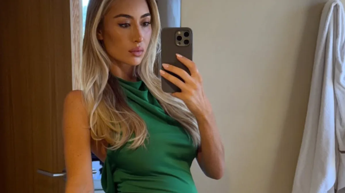 Sophie Habboo Shows Baby Bump in Red Mesh Dress