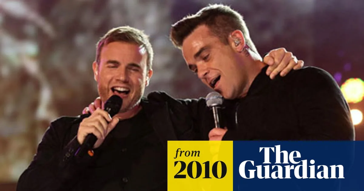 Take That Stars Robbie Williams and Gary Barlow Reunite On Stage After 15 Years